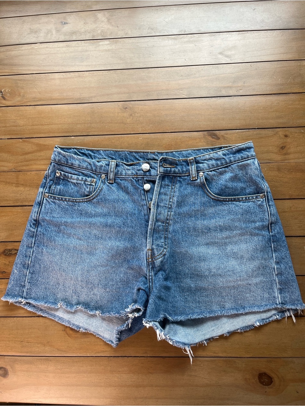 Djerf Avenue Frayed Hem High-Rise Denim Shorts in Blue